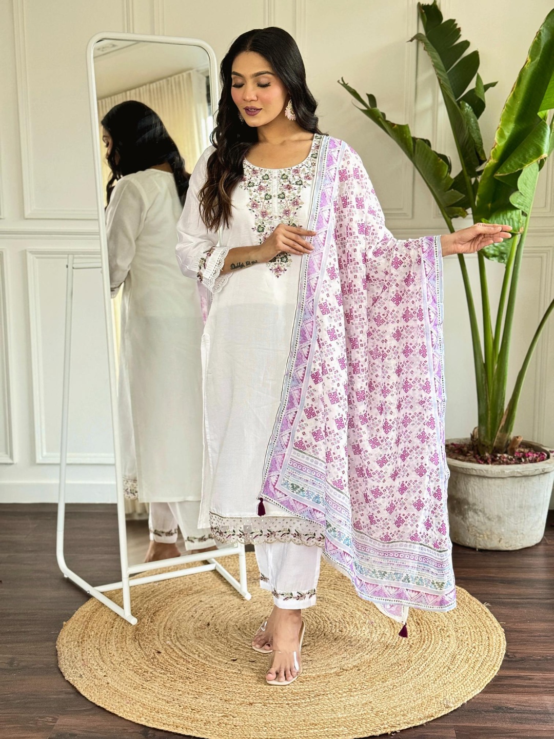 

Moda Rapido Floral Embroidered Sequunied Straight Kurta With Trousers And Dupatta, White