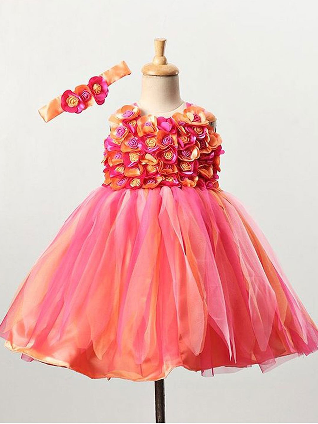 

Li & Li Boutique Pink and Peach Flower Frock With Multi stripes