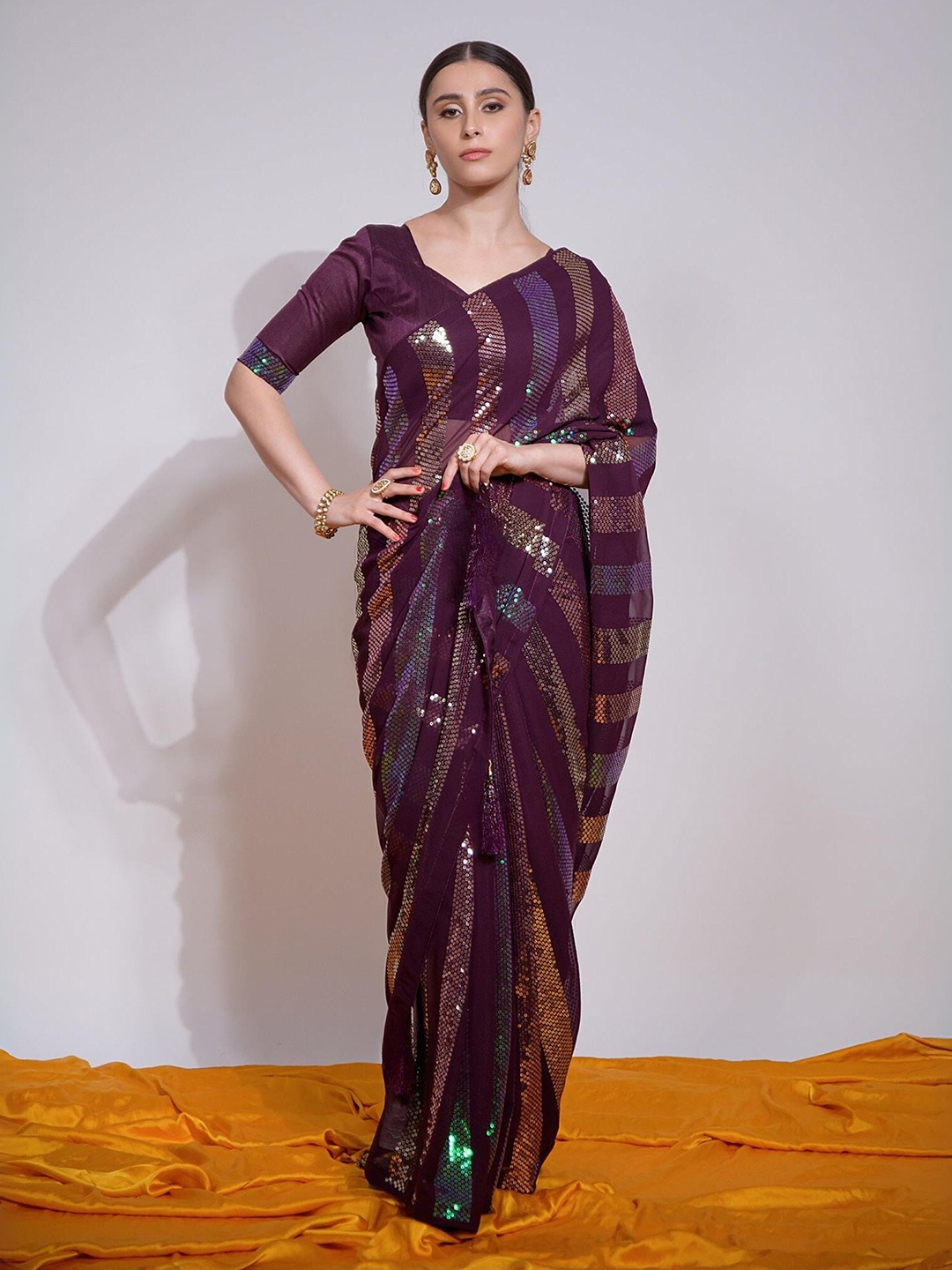 

Moda Rapido Striped Sequinned Pure Georgette Saree, Purple