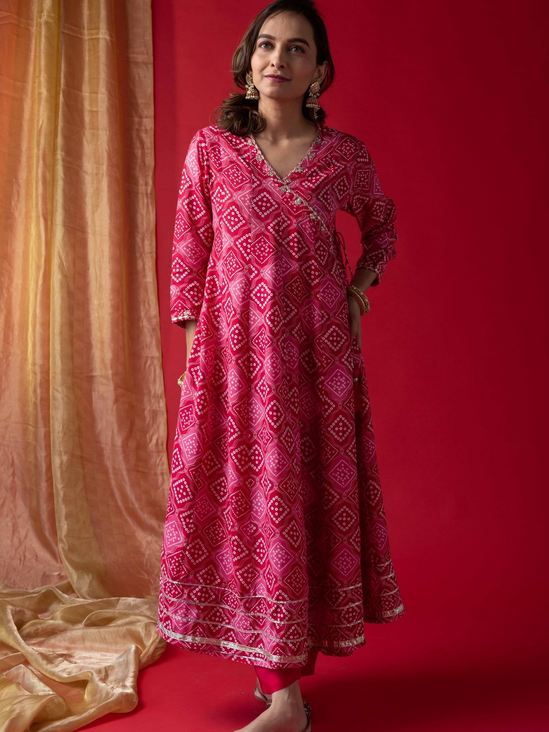 

KUSVAA Women Bandhani Printed Angrakha Gotta Patti Kurta with Trousers, Magenta