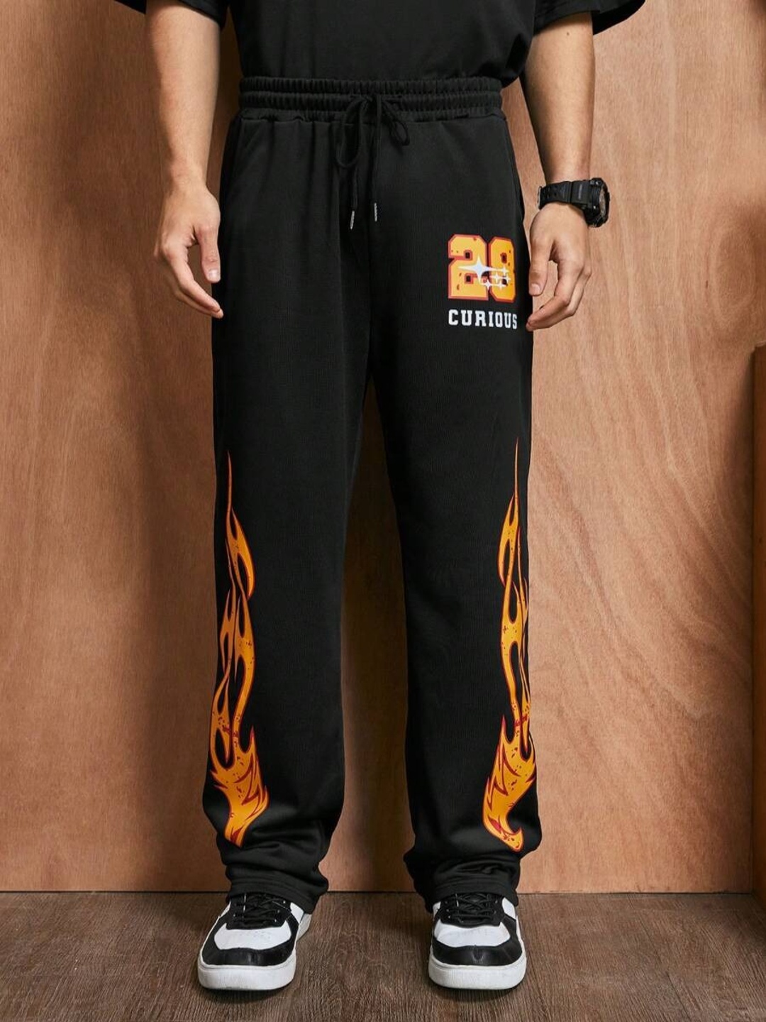 

FLYNOFF Men Printed Relaxed Fit Easy Wash Mid-Rise Trousers, Black