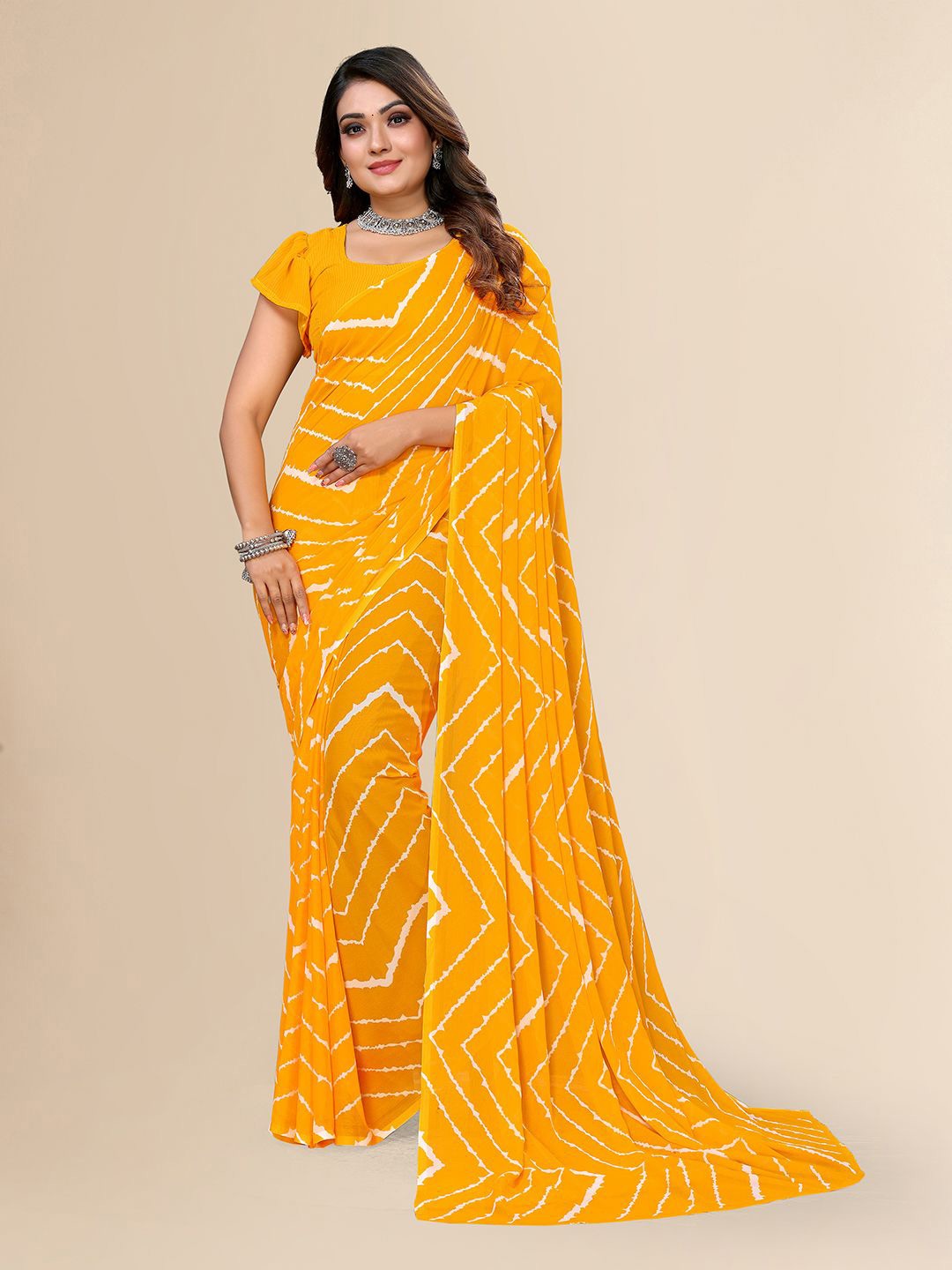 

Moda Rapido Leheriya Printed Saree, Yellow