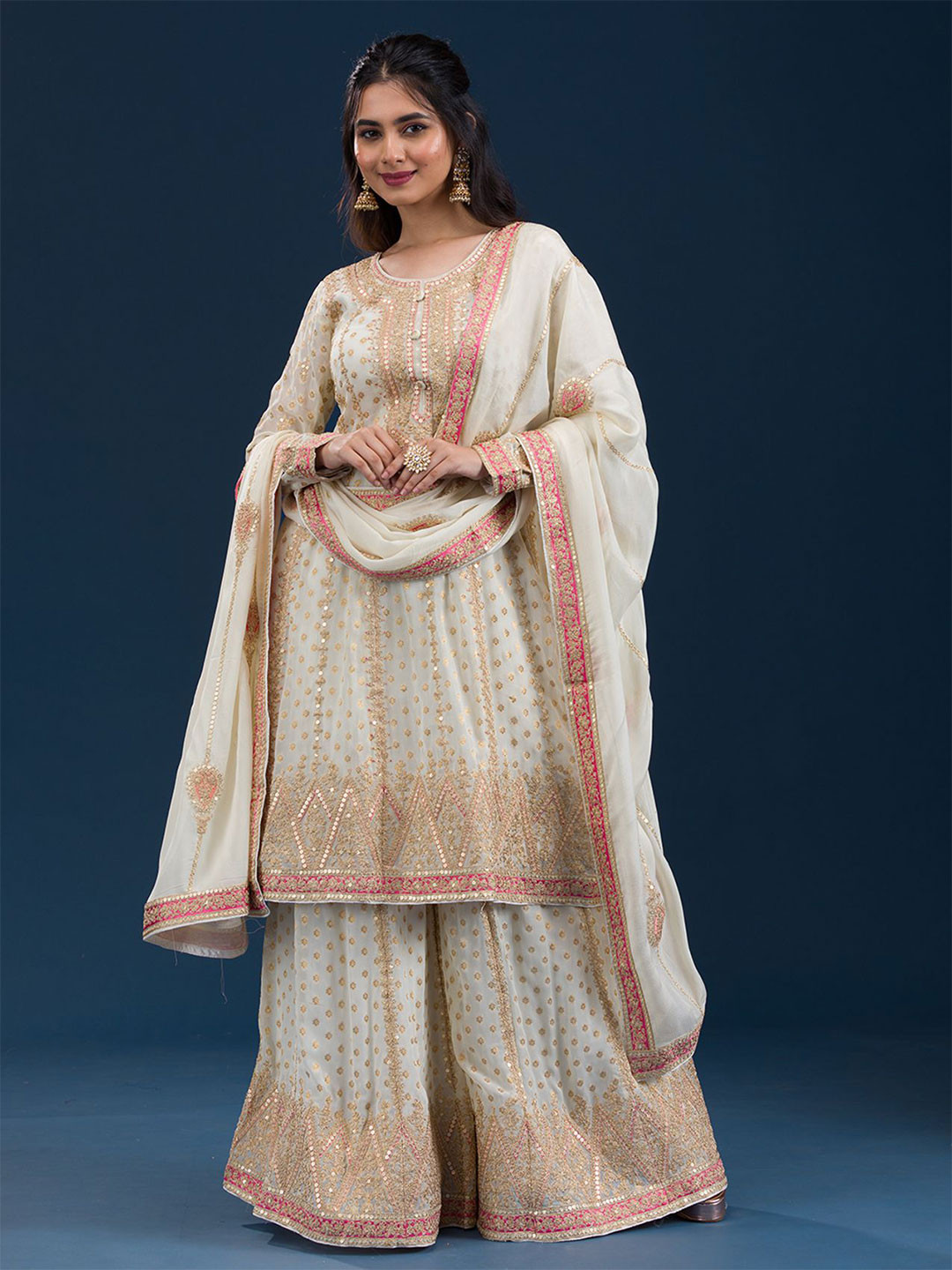 

Koskii Women Floral Embroidered Regular Sequinned Kurta with Sharara & With Dupatta, Off white