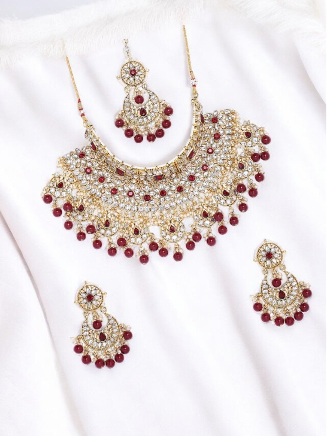 

Anouk Gold-Plated And Red Kundan Studded And Beaded Necklace With Earrings And Maang Tikka