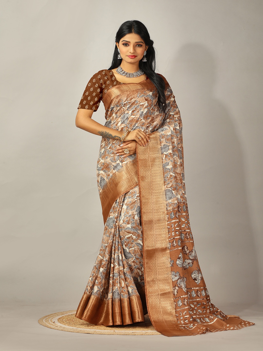 

NIRMAL CREATION Floral Printed Zari Saree, Brown