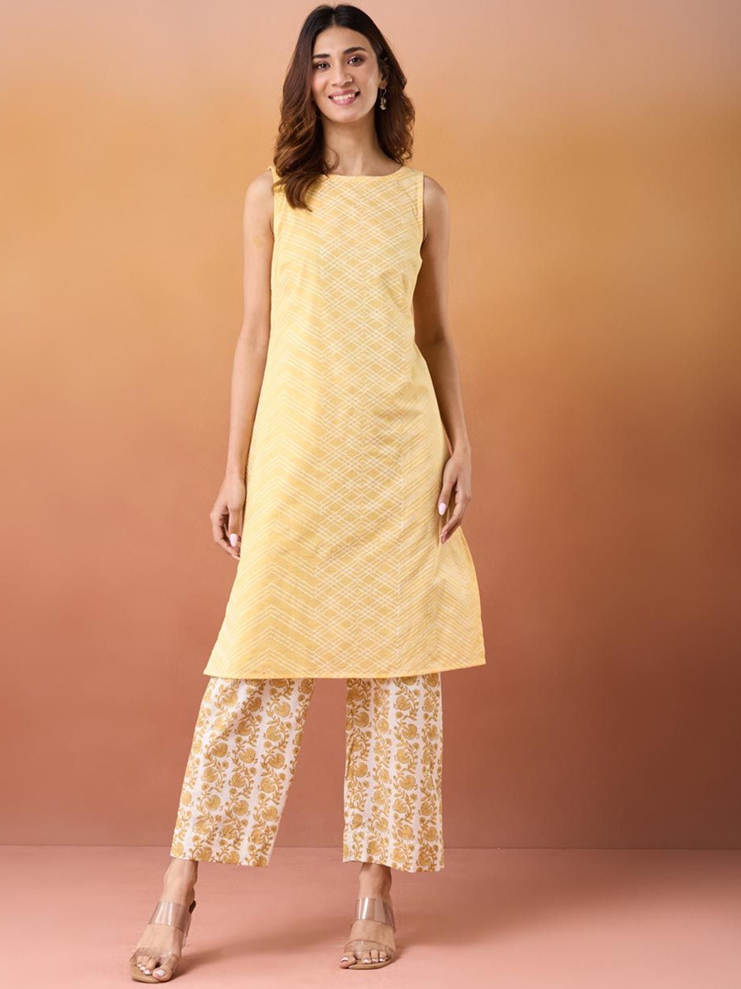 

Fabindia Abstract Printed Boat Neck Cotton Straight Kurta, Yellow