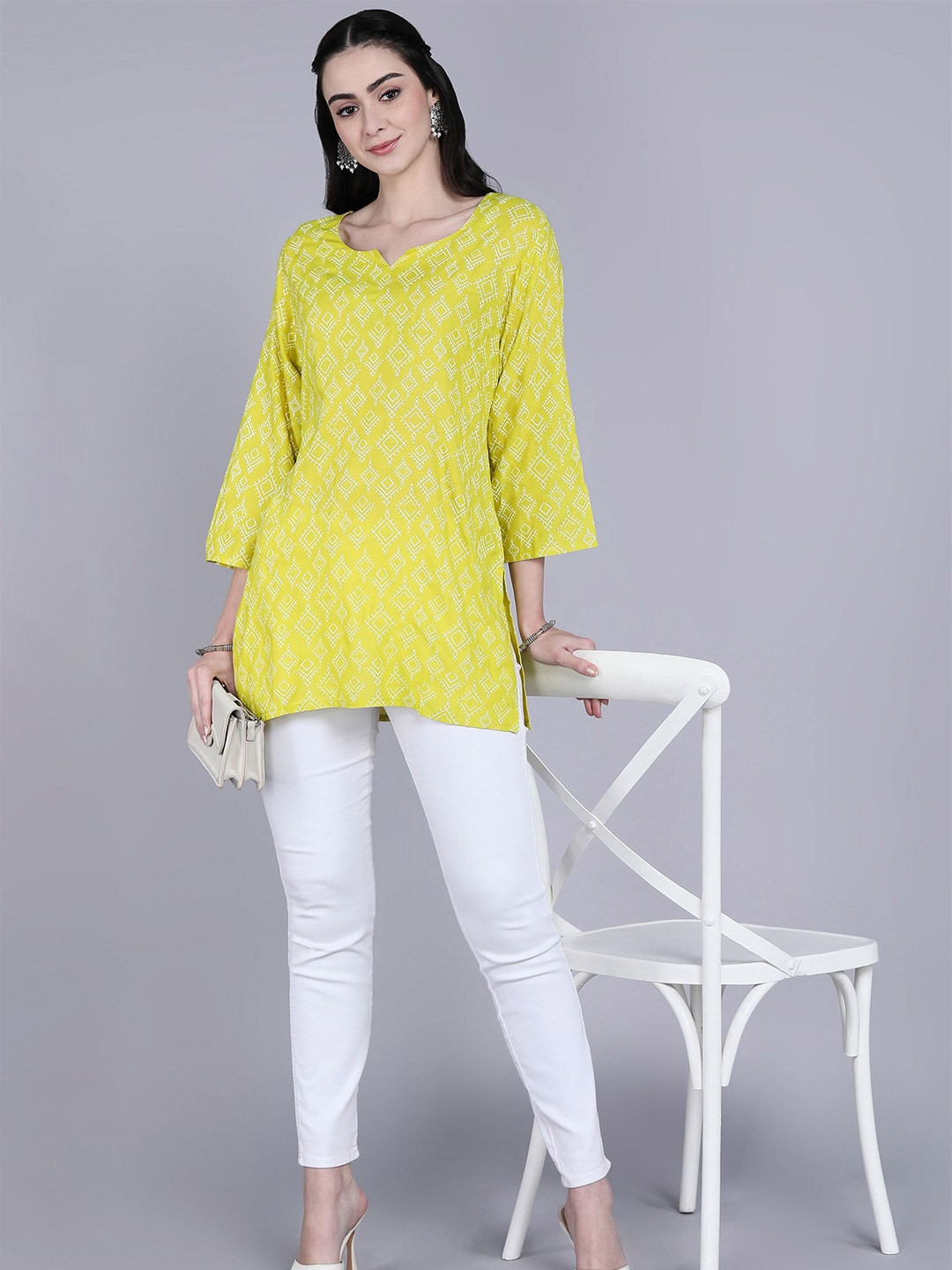 

Tviksha Fashion Women Printed Mandarin Collar Kurti, Yellow