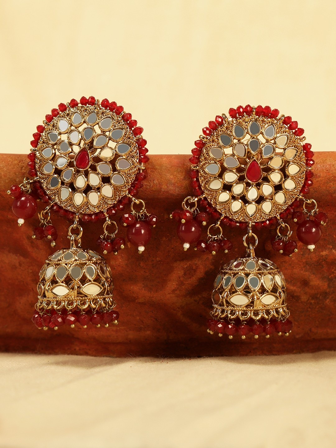 

Anouk Maroon Gold-Plated Mirror And Pearls Studded Dome Shaped Jhumkas