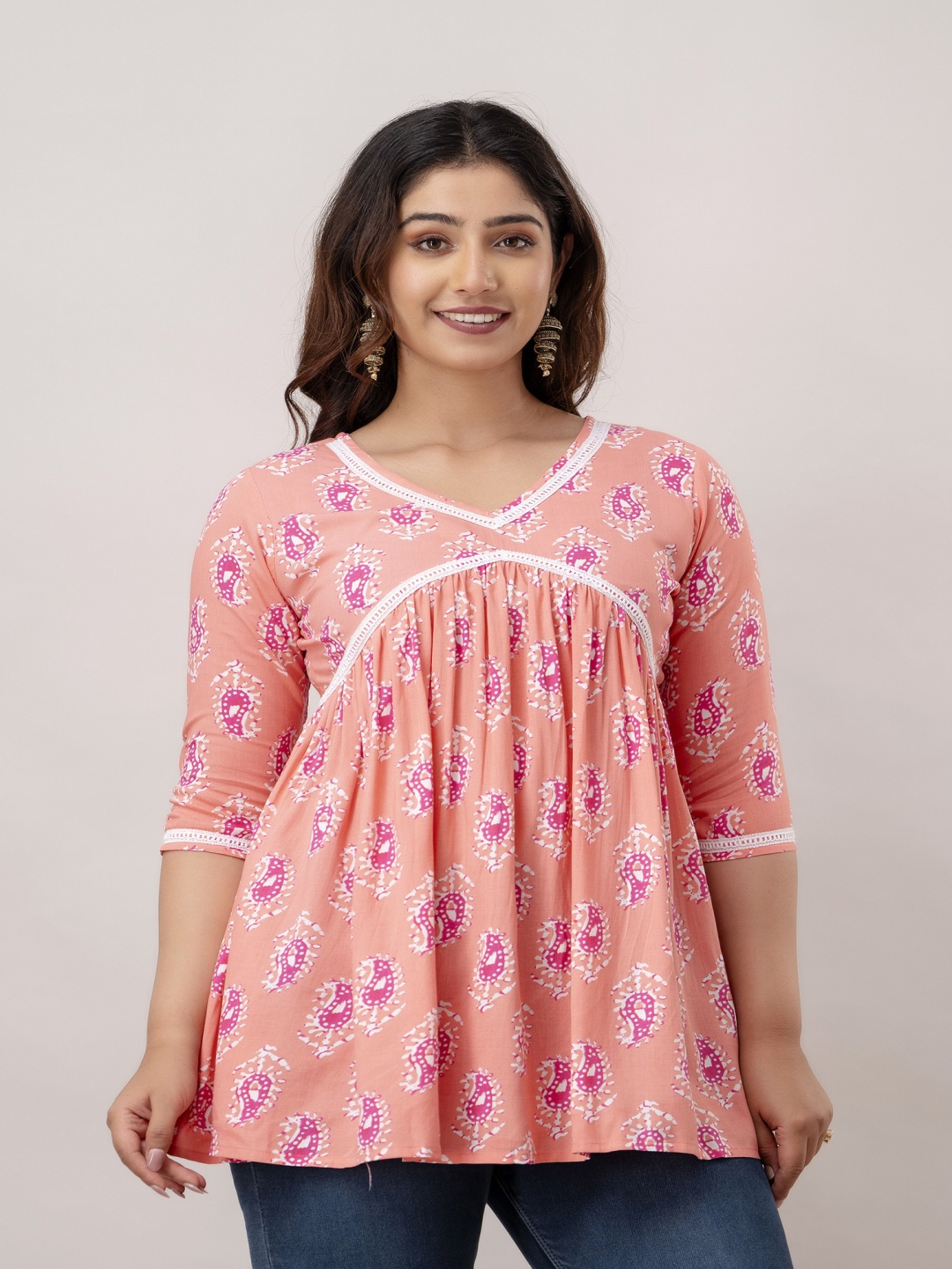 

Tailors Art Paisley Printed V-Neck Thread Work Thread Work Pleated Kurti, Pink