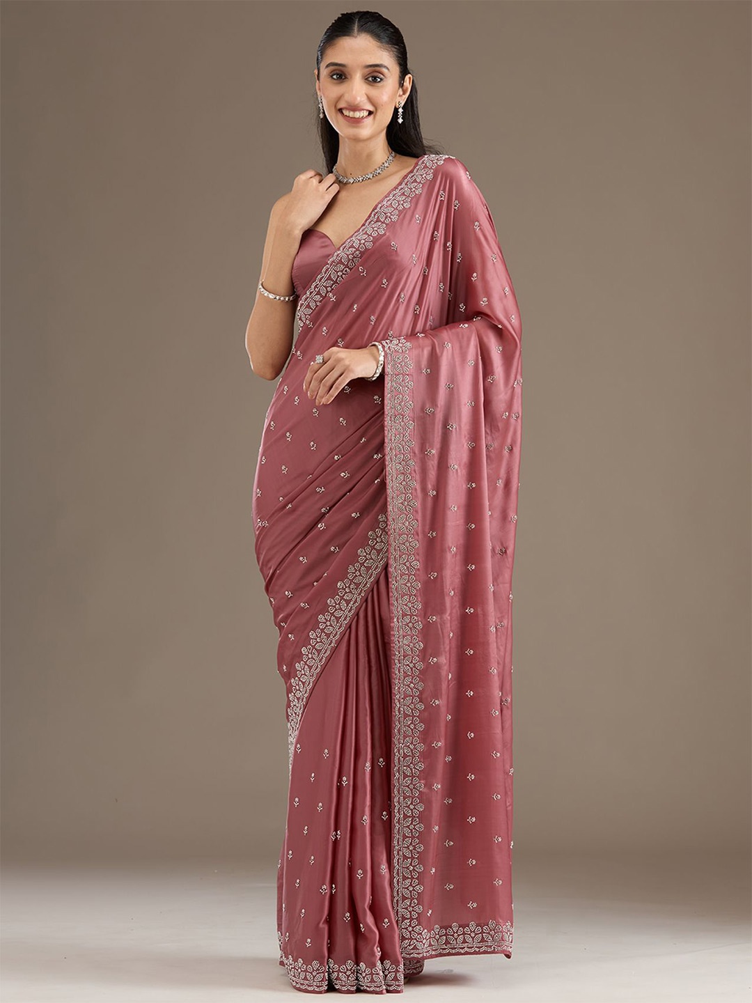 

Koskii Embellished Beads and Stones Rust Embellished Satin Saree