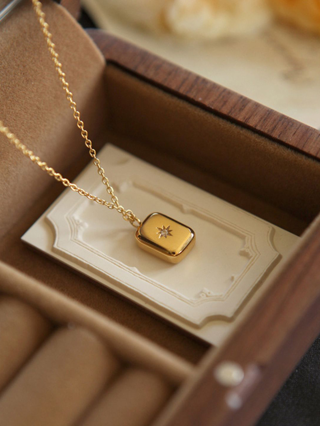 

Just Lil Things Gold-Plated Artificial Stones Studded Square Pendant With Chain