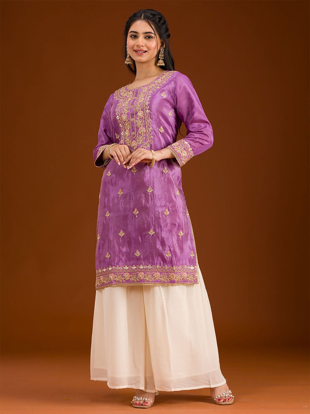 

Koskii Women Floral Embroidered Regular Sequinned Kurta with Sharara & With Dupatta, Lavender