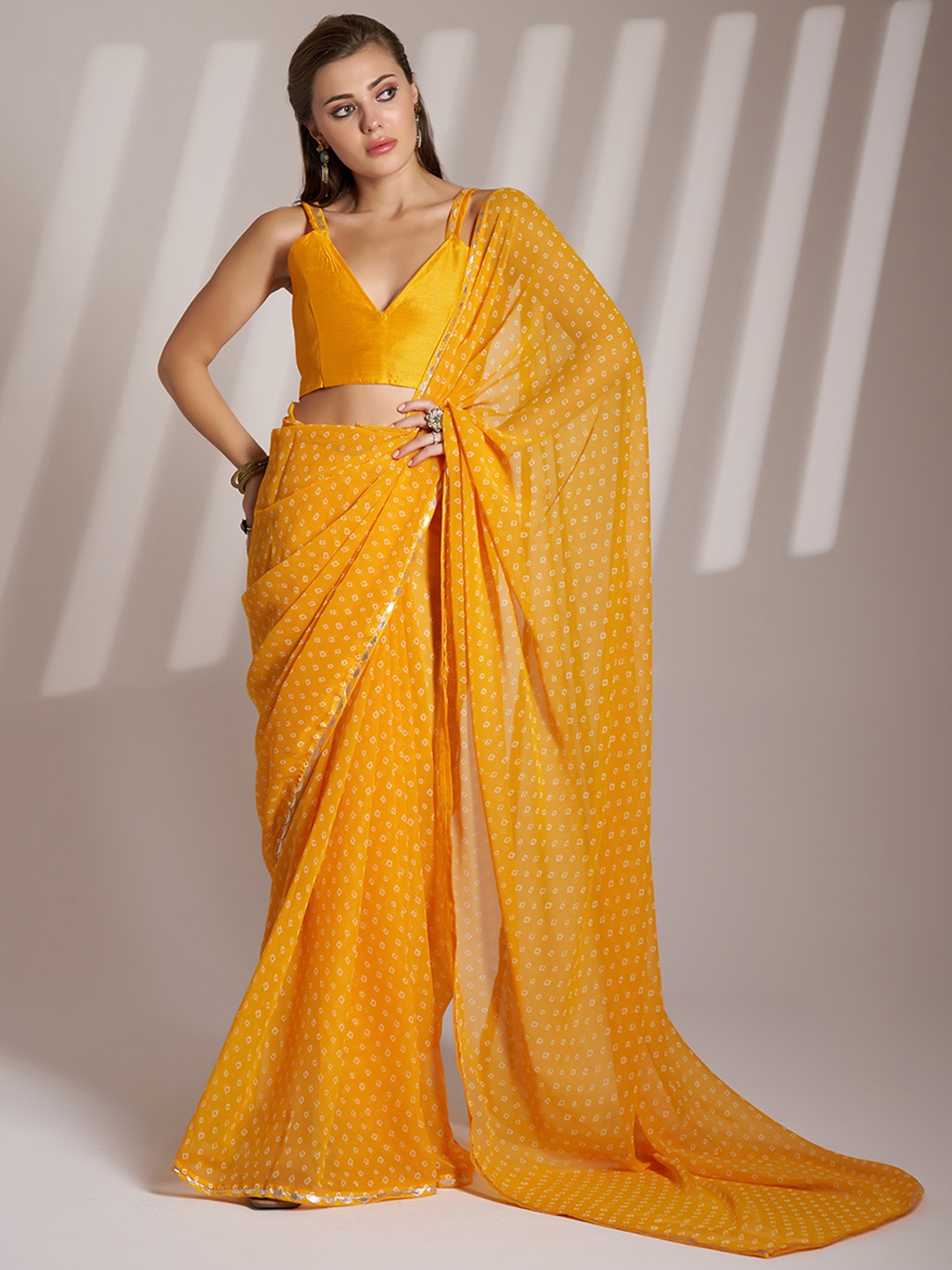 

Mitera Bandhani Printed Gotta Patti Pure Georgette Saree, Yellow