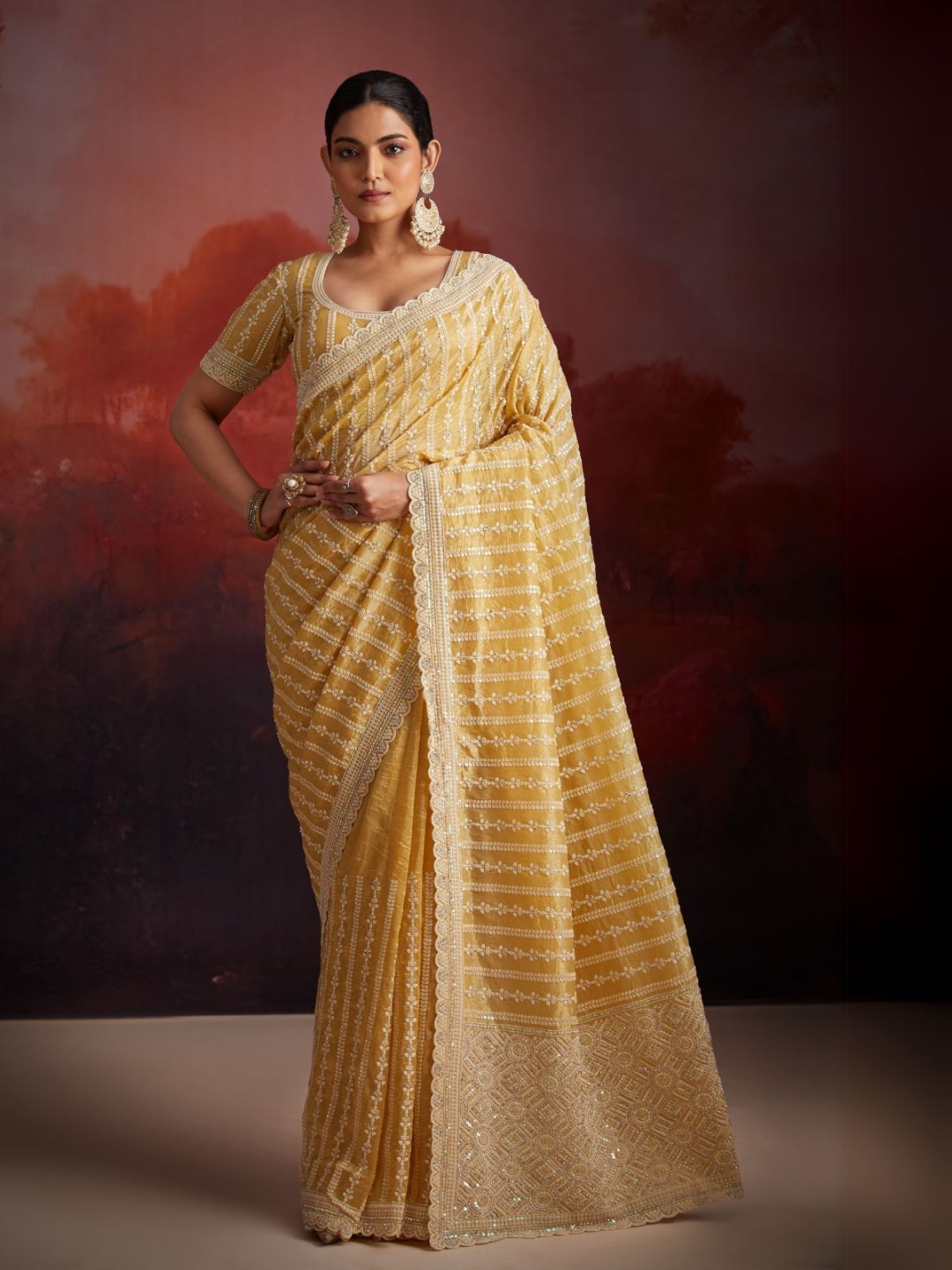 

ODETTE Mustard Embellished Ethnic Motifs Beads and Stones Organza Heavy Work Saree