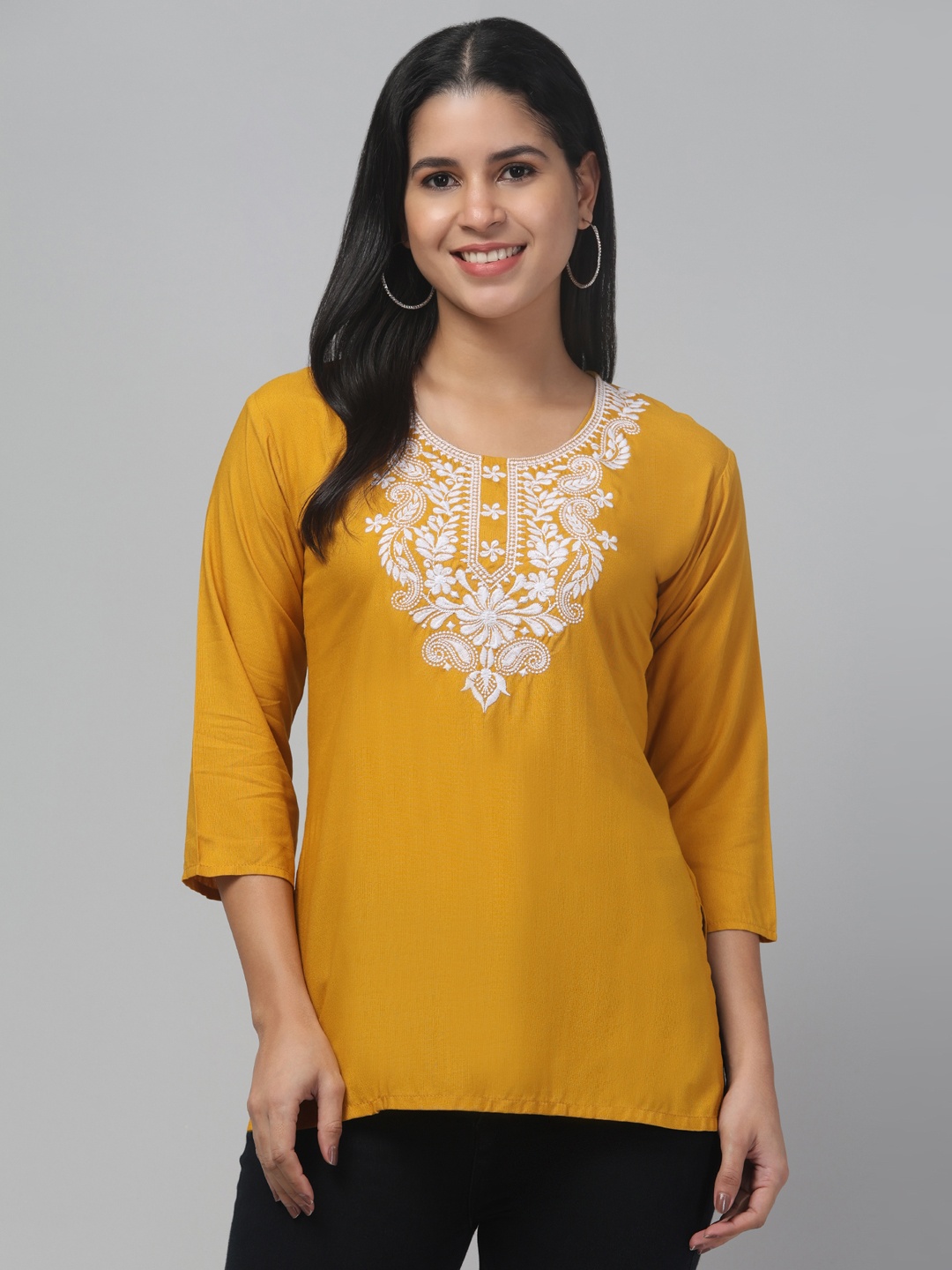 

Trend Level Ethnic Motifs Embroidered Kurti, Mustard