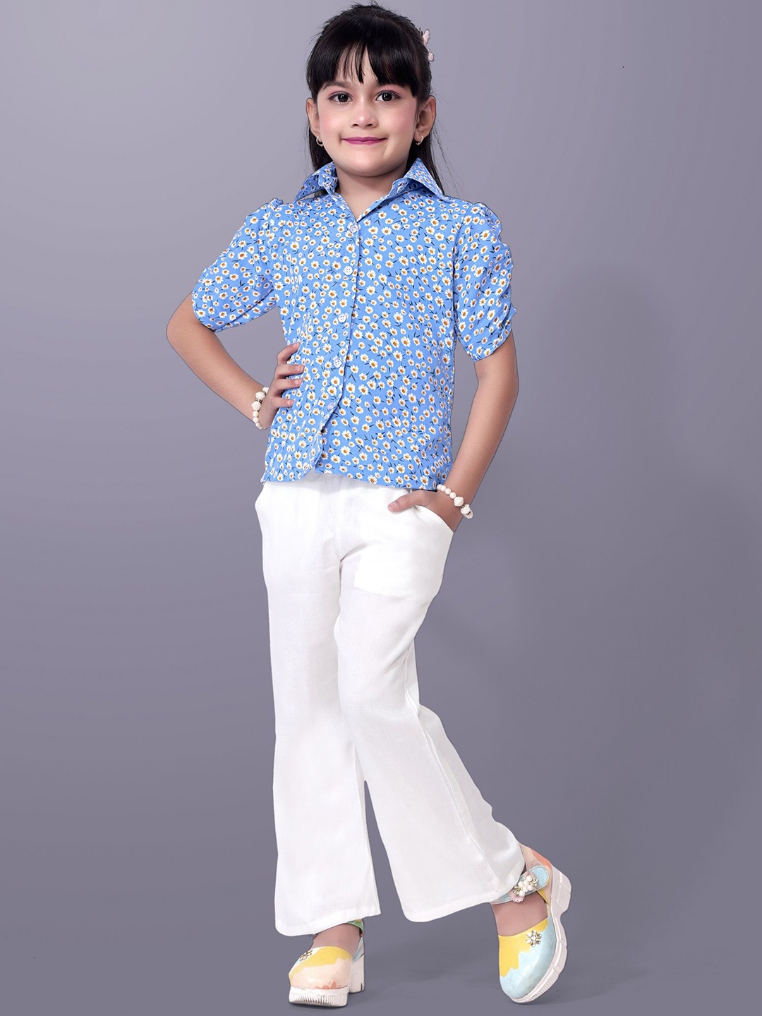 

Aarya Designer Girls Printed Puffed Sleeves Shirt With Trouser, Blue