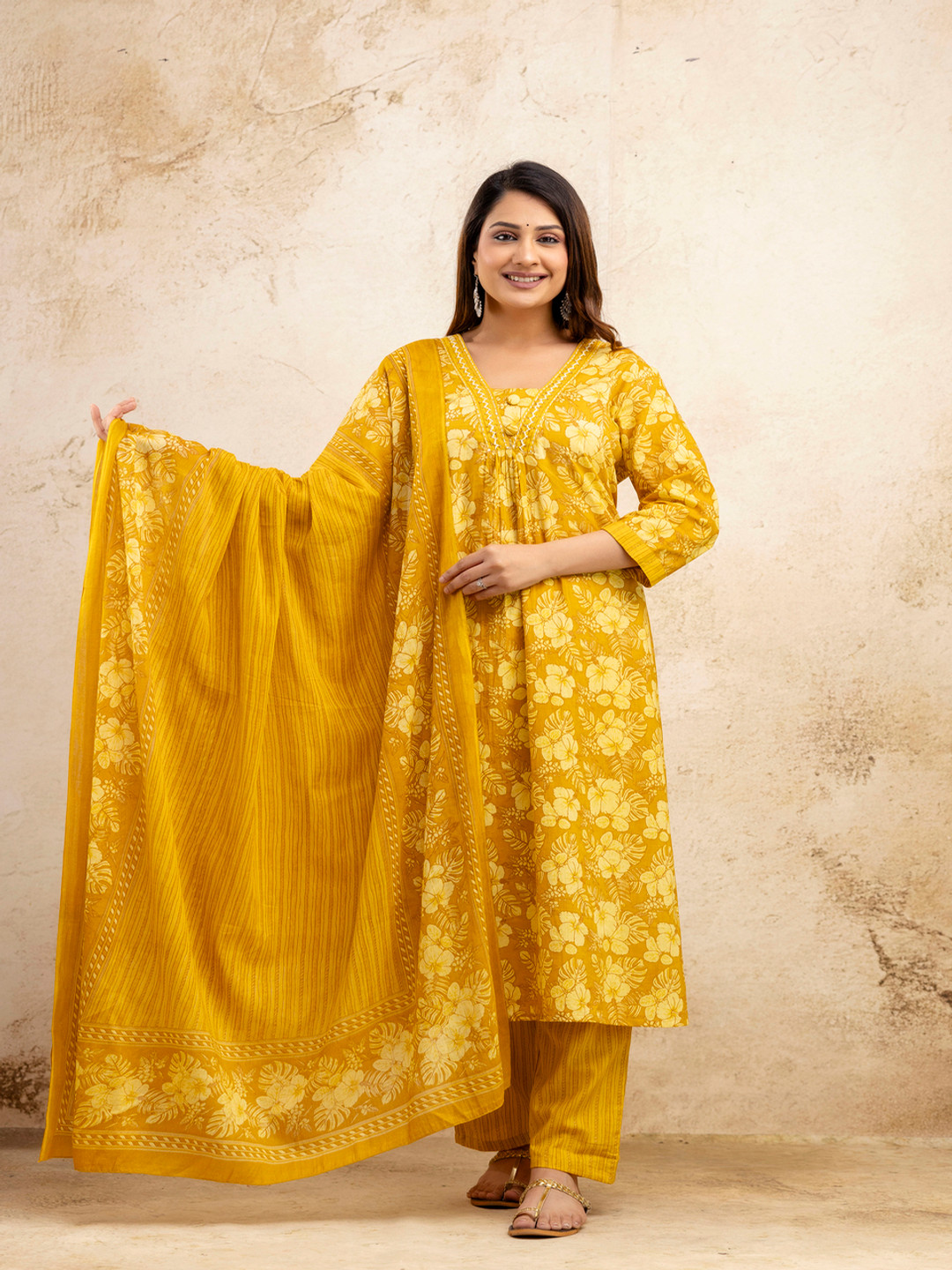 

NISHIRE Floral Printed V-Neck Pleated Pure Cotton A-Line Kurta With Trouser & Dupatta, Yellow