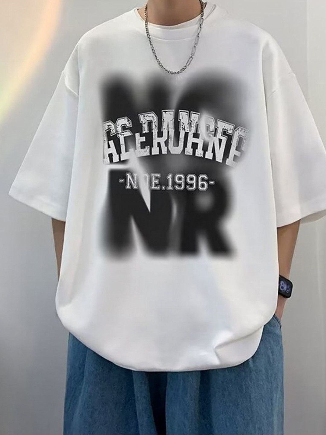 

StyleCast x Revolte Men Typography Printed Round NeckOversized T-shirt, White