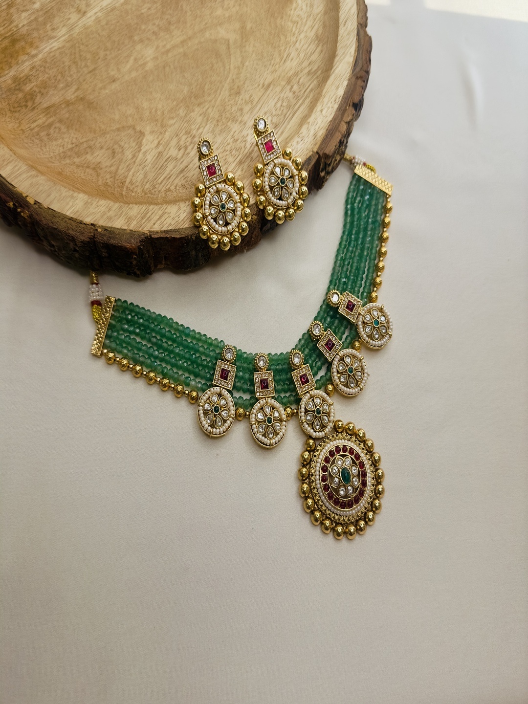 

Stridhan Rajwadi Gold-Plated Kundan Studded and Beaded Jewellery Set