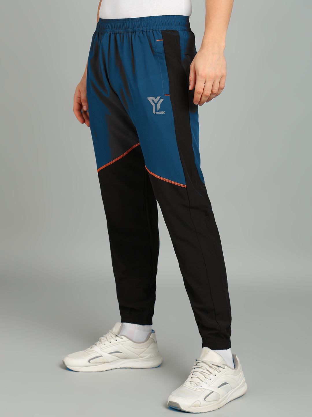 

YUNEK Men Colourblocked Mid Rise Track Pants, Blue