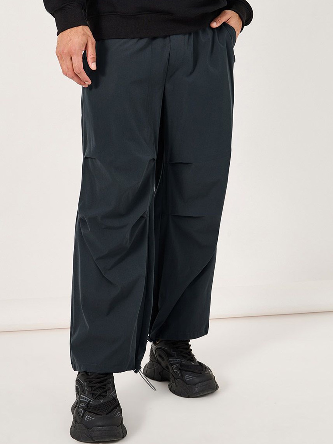 

Styli Men Oversized Fit Parachute Pants, Grey