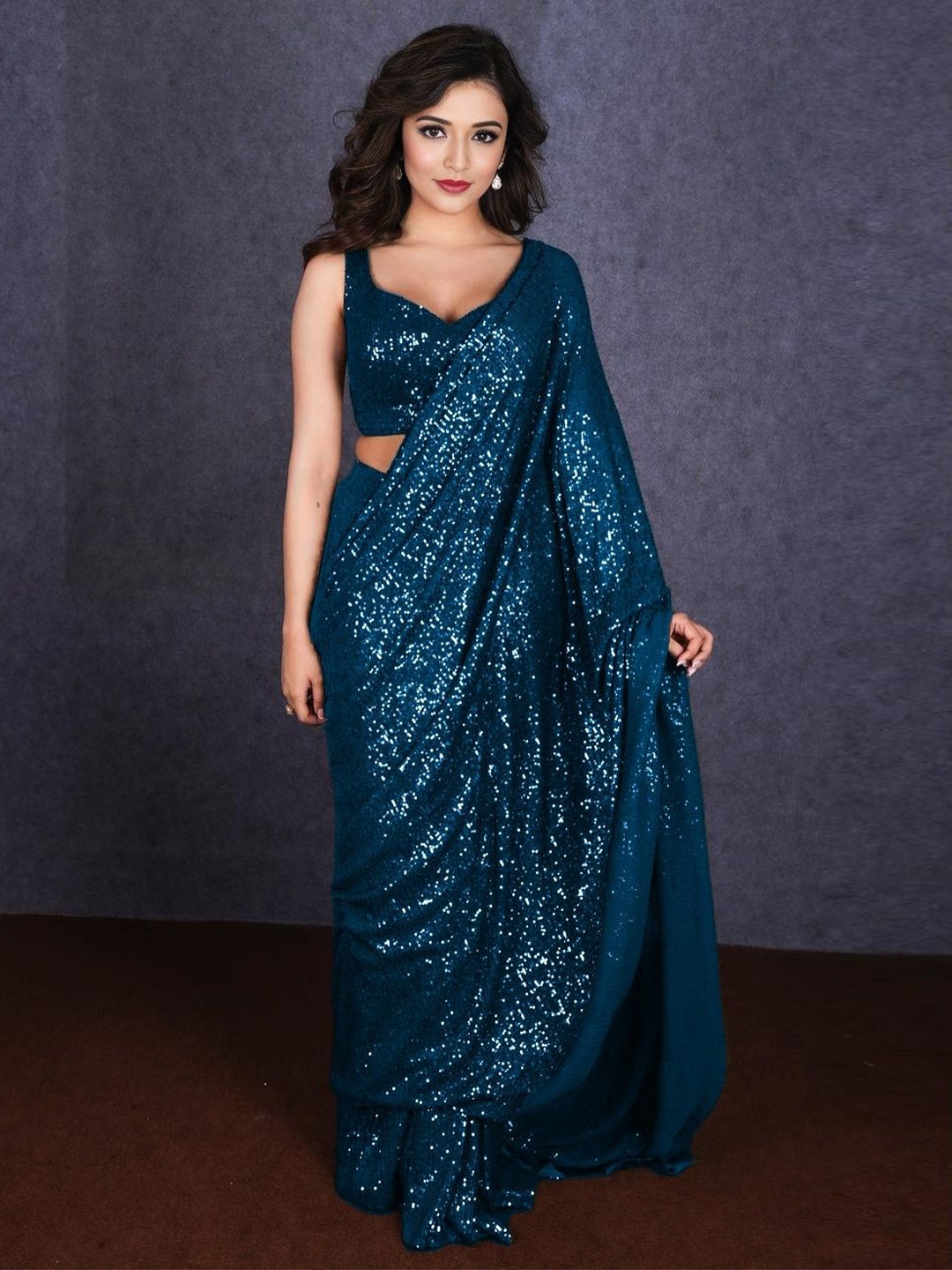

ANJANI TEXTILE Embellished Sequinned Poly Georgette Saree, Turquoise blue