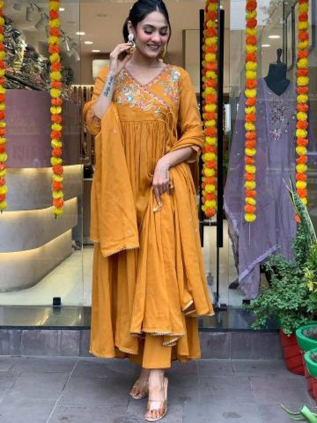 

Moda Rapido Floral Embroidered V-Neck Pleated Anarkali Kurta With Trousers & Dupatta, Orange