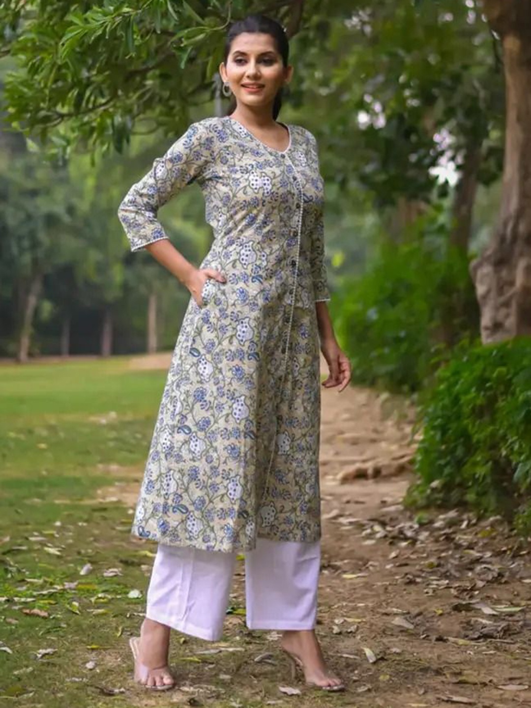 

Vivika Floral Printed V-Neck Pure Cotton A-Line Kurta, Beige