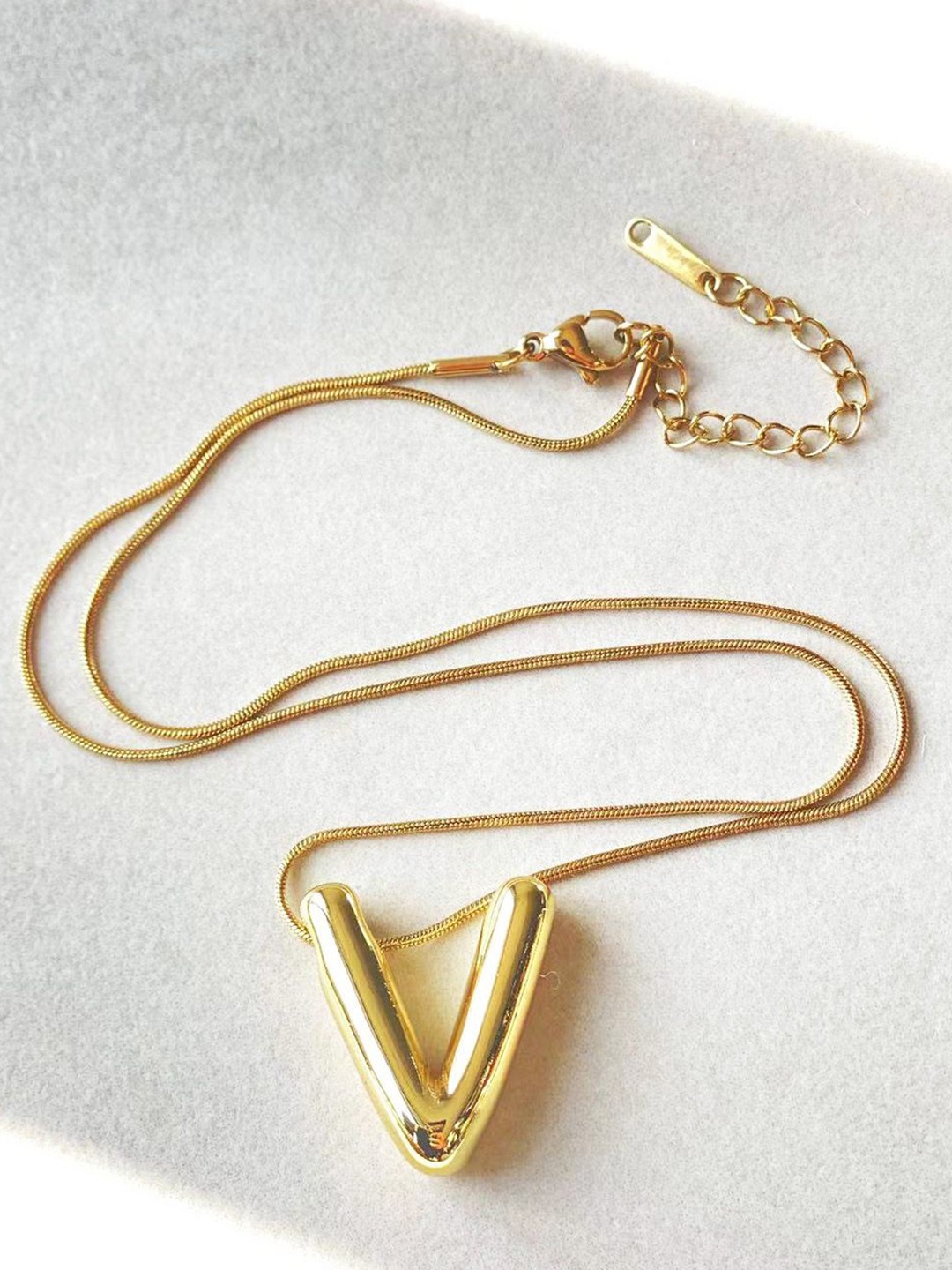 

DressBerry Gold-Plated Contemporary Shaped Pendants With Chains