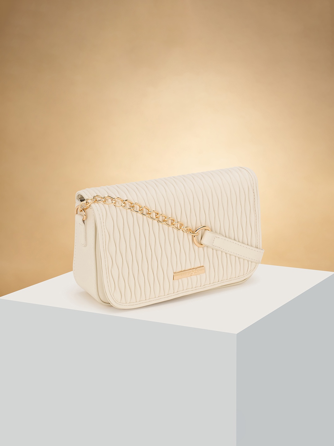 

Forever Glam by Pantaloons Women Textured Structured Sling Bag, Beige
