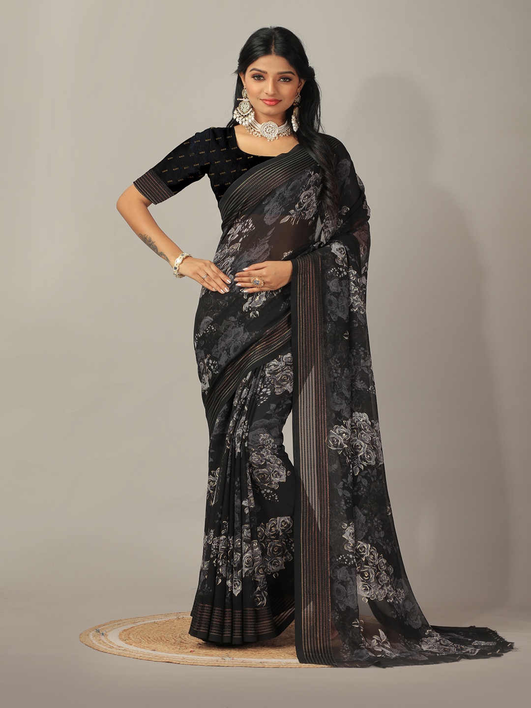 

A.V.M. SILK MILLS Floral Printed Pure Georgette Saree, Black