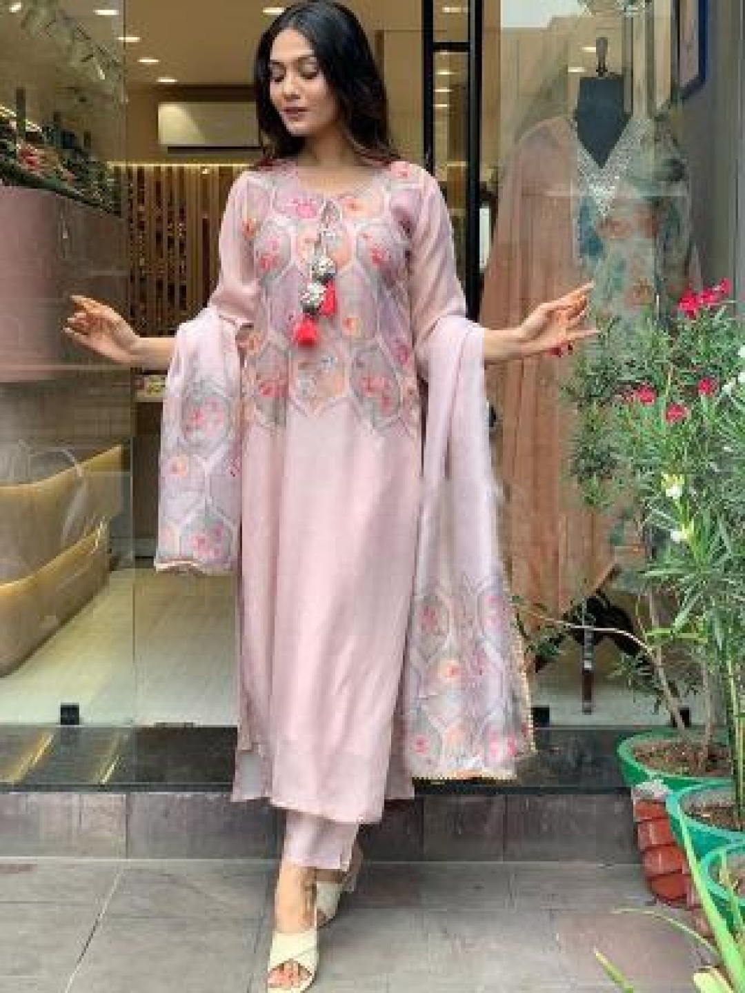 

Moda Rapido Peach Floral Printed Tie-Up Neck Straight Kurta With Trousers And Dupatta