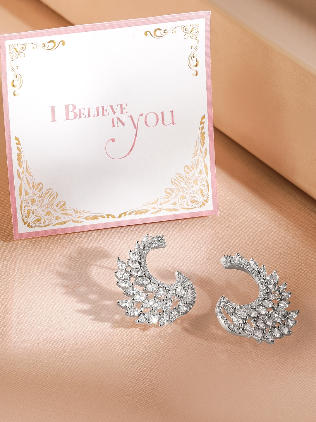 

Rubans Valentine's Silver-Toned & White Handcrafted Feather Shaped Drop Earrings