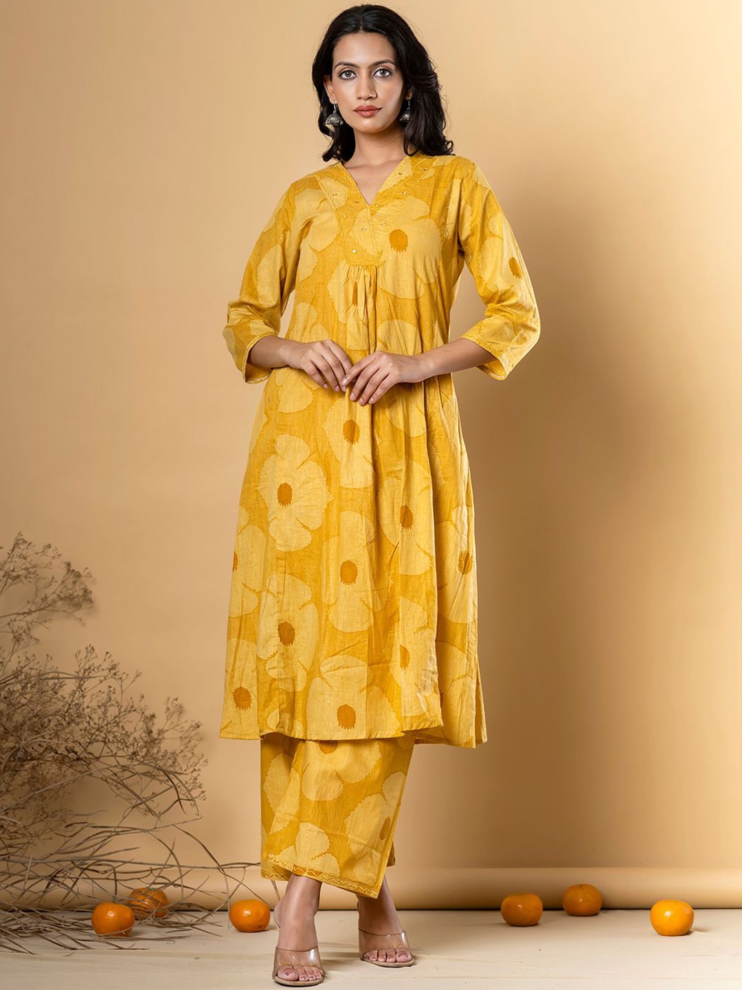 

Readiprint Fashions Floral Printed V-Neck Pure Cotton A-Line Kurta With Palazzos, Mustard