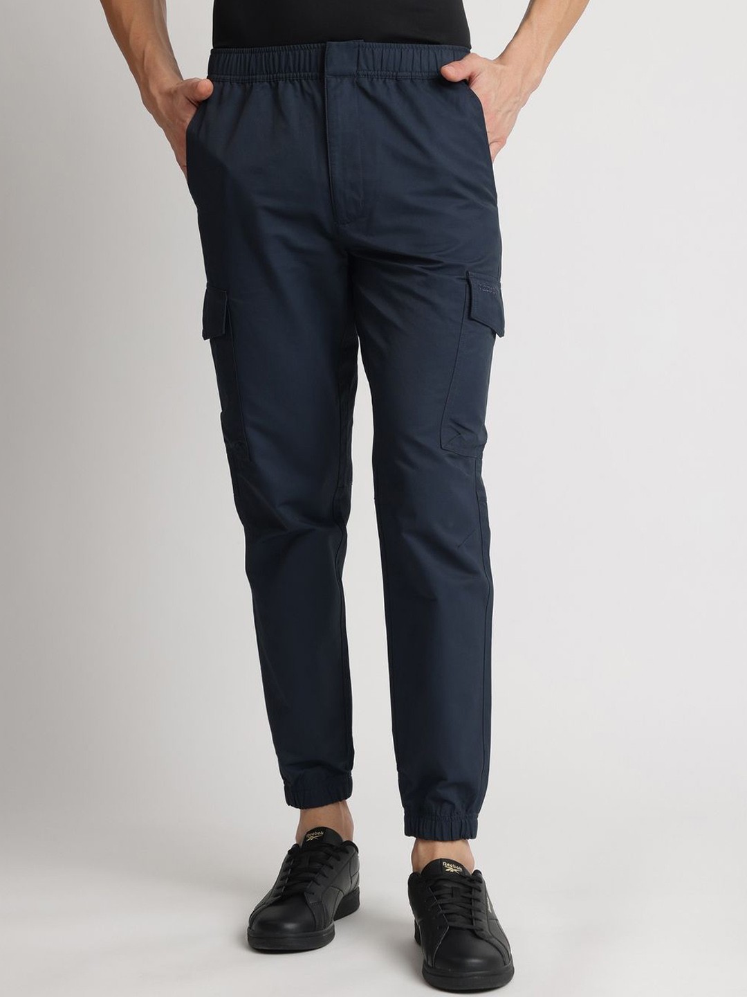 

Reebok Men Regular Fit Mid Rise Trousers, Navy blue