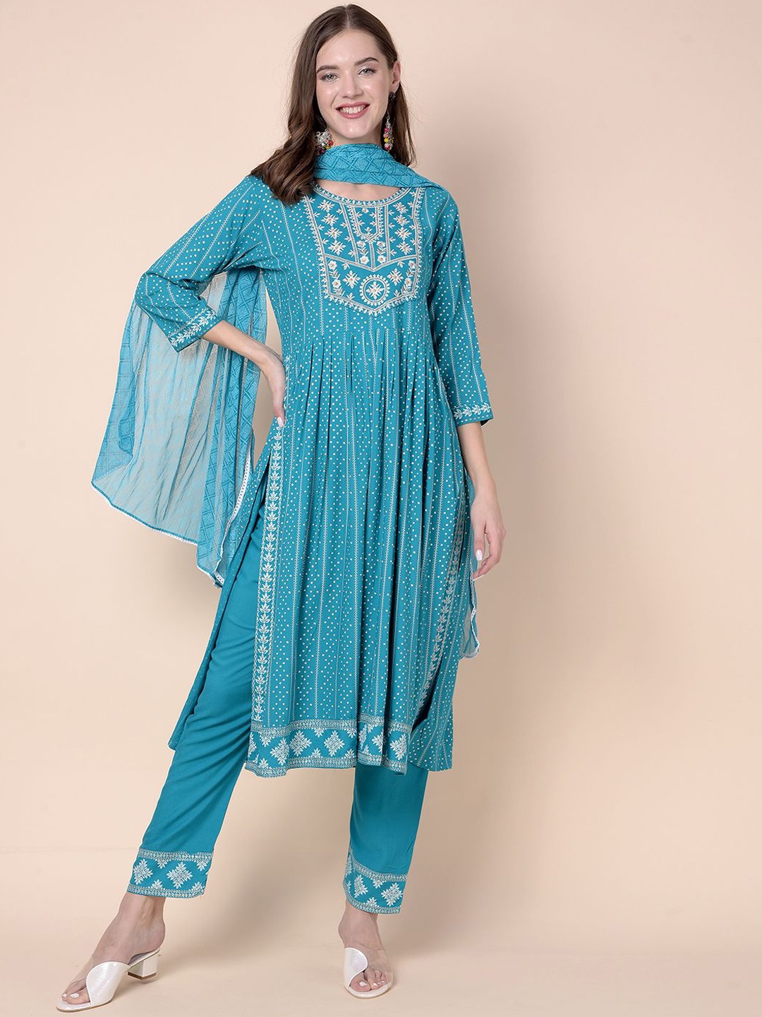 

Moda Rapido Women Embroidered High Slit Thread Work Kurta with Trousers & With Dupatta, Turquoise blue