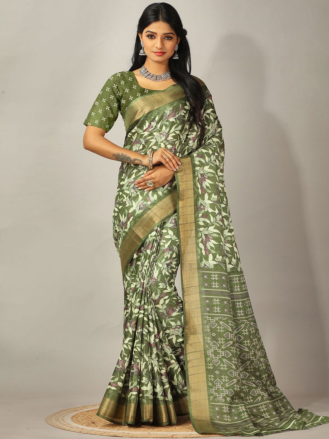 

NIRMAL CREATION Floral Printed Zari Pure Crepe Saree, Green