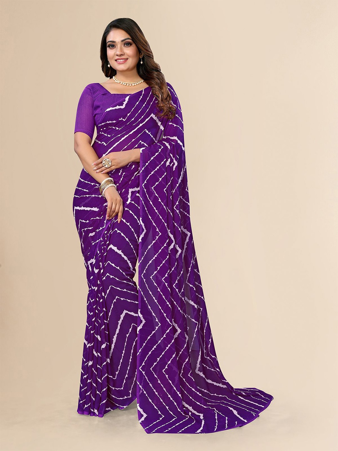 

Moda Rapido Women Leheriya Printed Saree With Blouse Piece, Purple