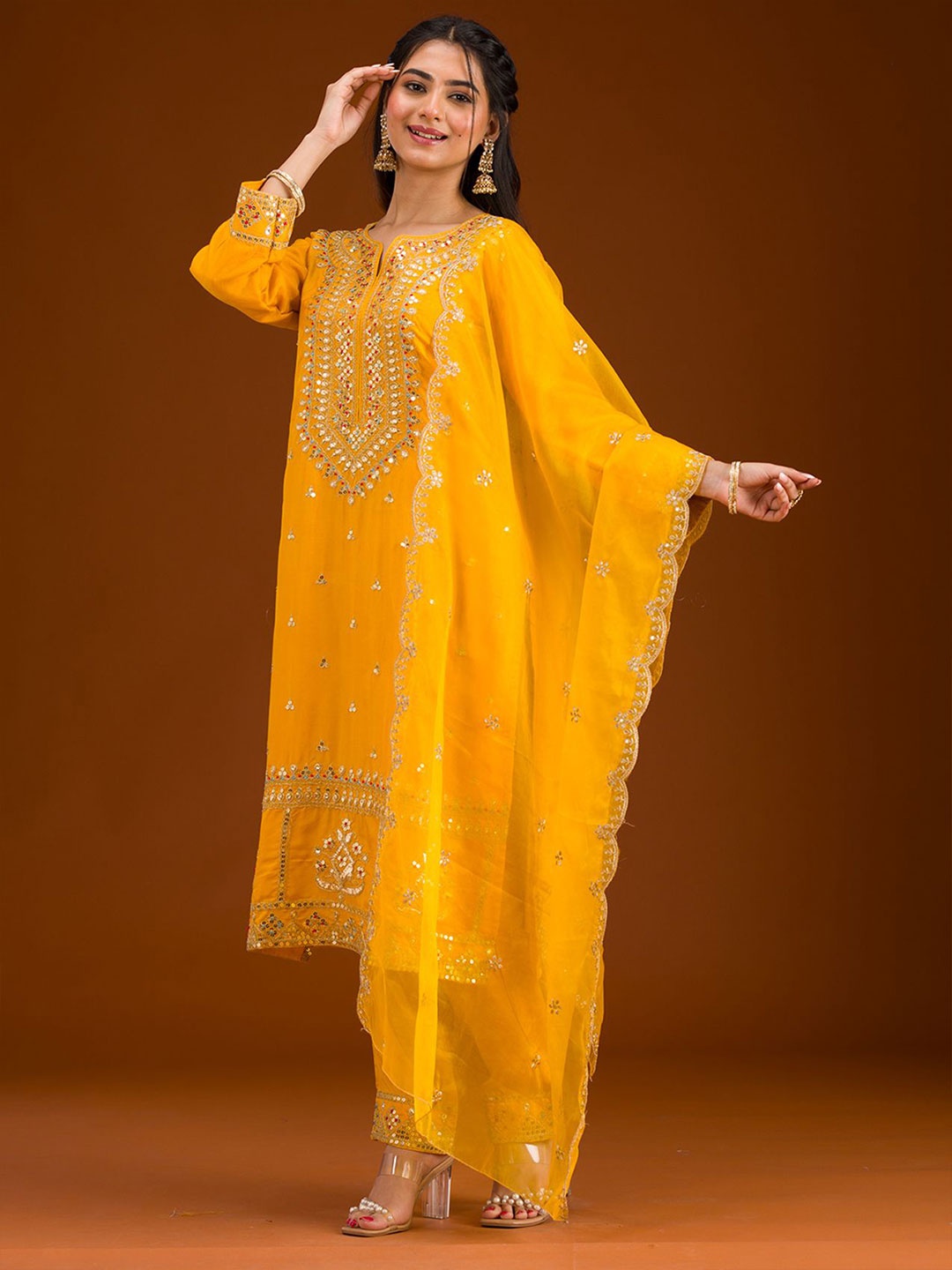 

Koskii Women Floral Embroidered Regular Sequinned Kurta with Trousers & With Dupatta, Mustard