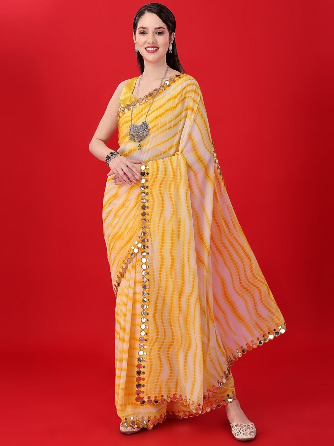 

Moda Rapido Striped Mirror Work Pure Georgette Leheriya Saree, Yellow