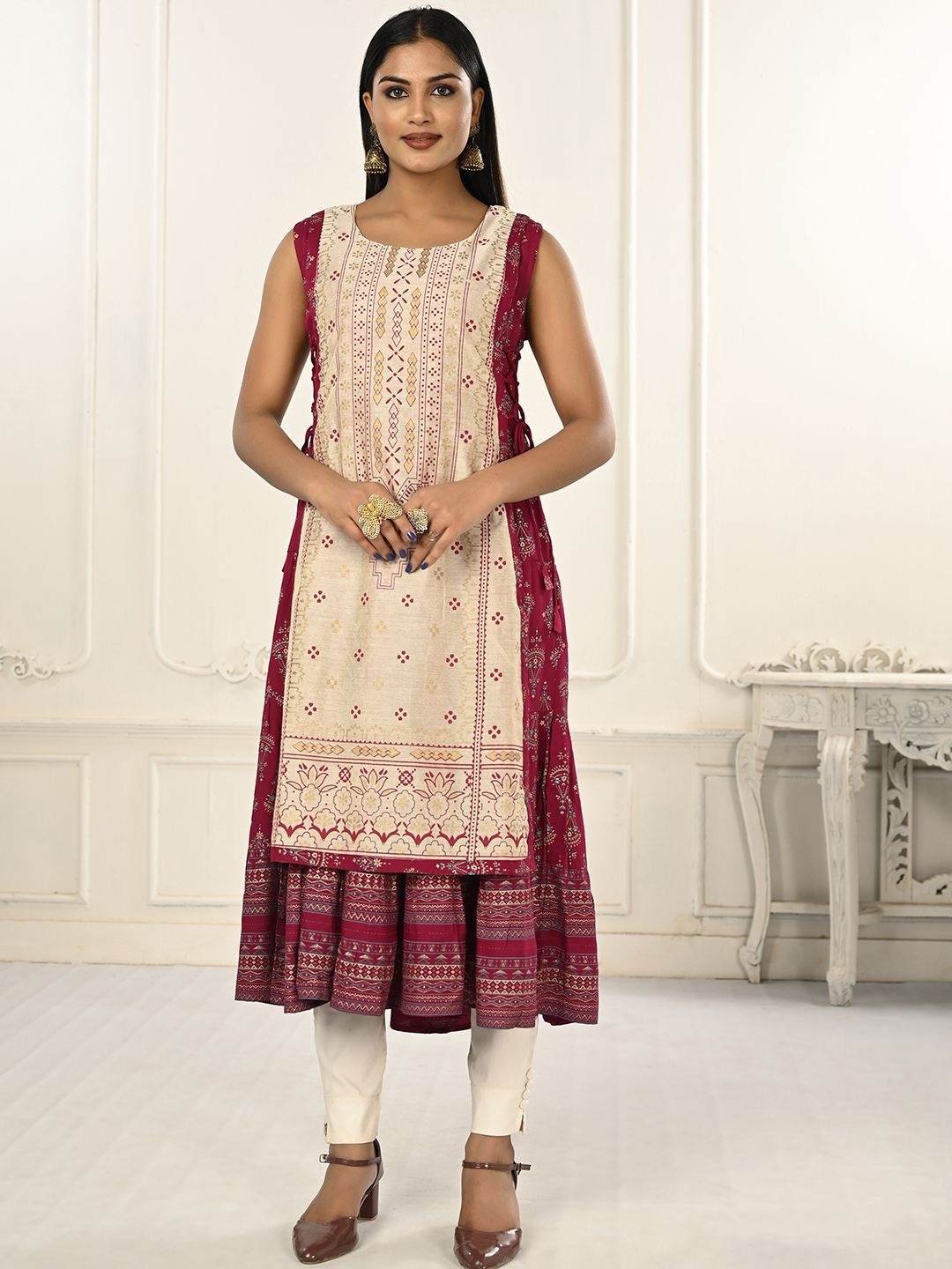 

Krimmple Ethnic Motifs Printed Cotton Sleeveless A-Line Kurta, Maroon