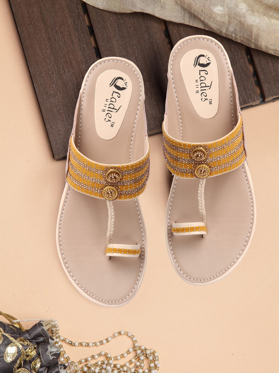 

Ladies Hub Women Embellished One Toe Kolhapuri Flats, Cream