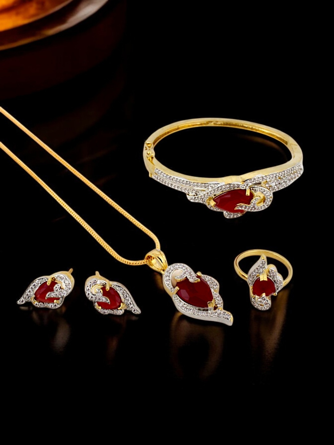 

LUCKY JEWELLERY Gold Plated AD Stone Studded Necklace With Earrings, Ring & Bracelet