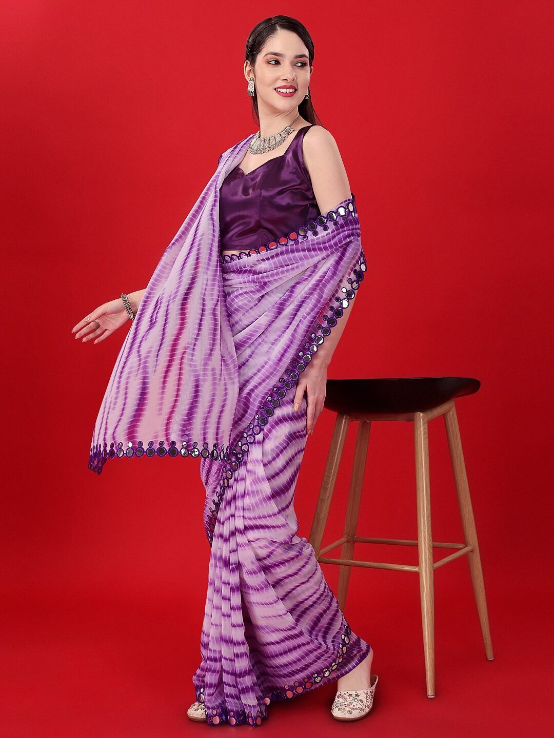 

Moda Rapido Tie and Dye Mirror Work Pure Georgette Leheriya Saree, Purple