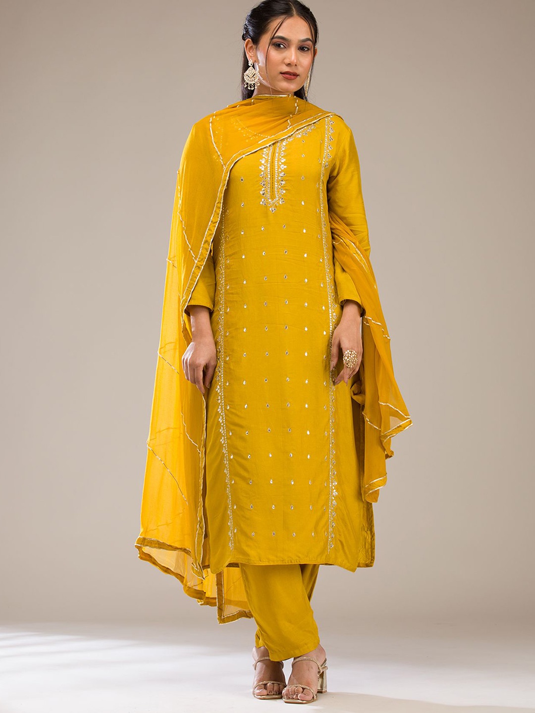 

Koskii Women Embroidered Regular Mirror Work Kurta with Trousers & With Dupatta, Mustard