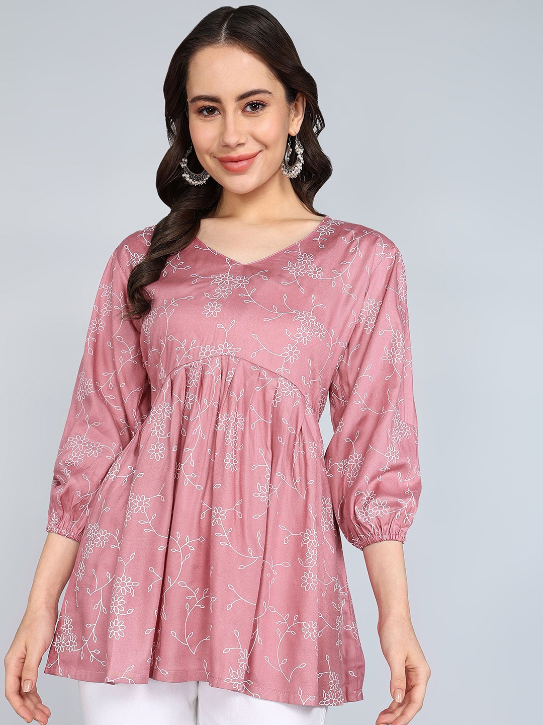 

Tviksha Fashion Floral Printed Round Neck Peplum Top, Peach