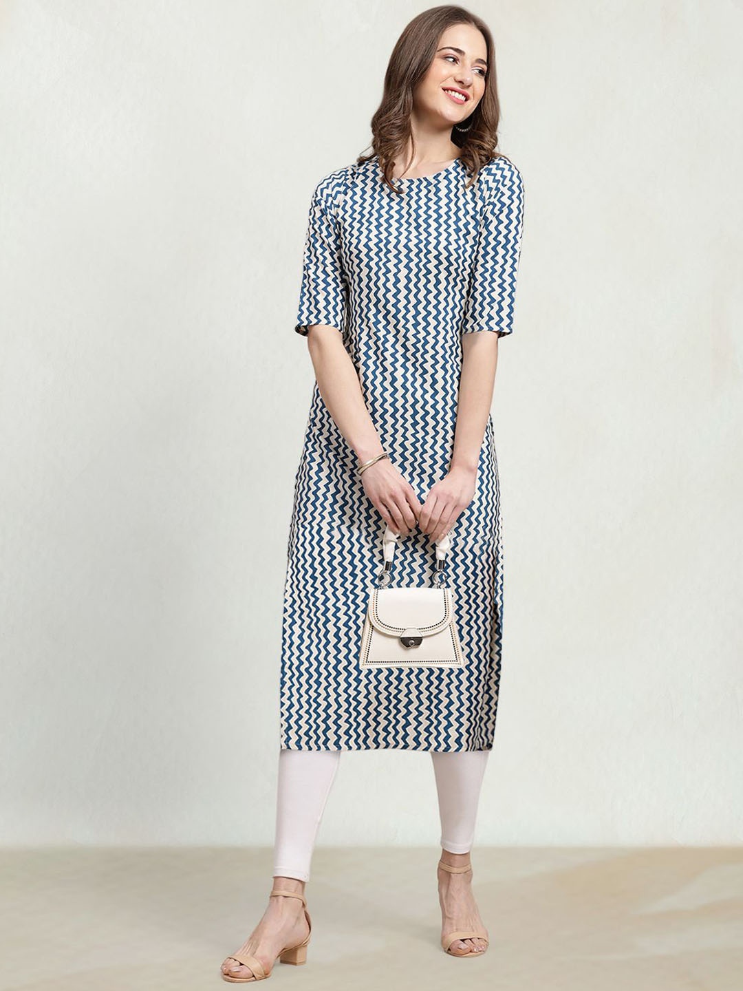 

Moda Rapido Geometric Printed Round Neck Straight Kurta, Blue