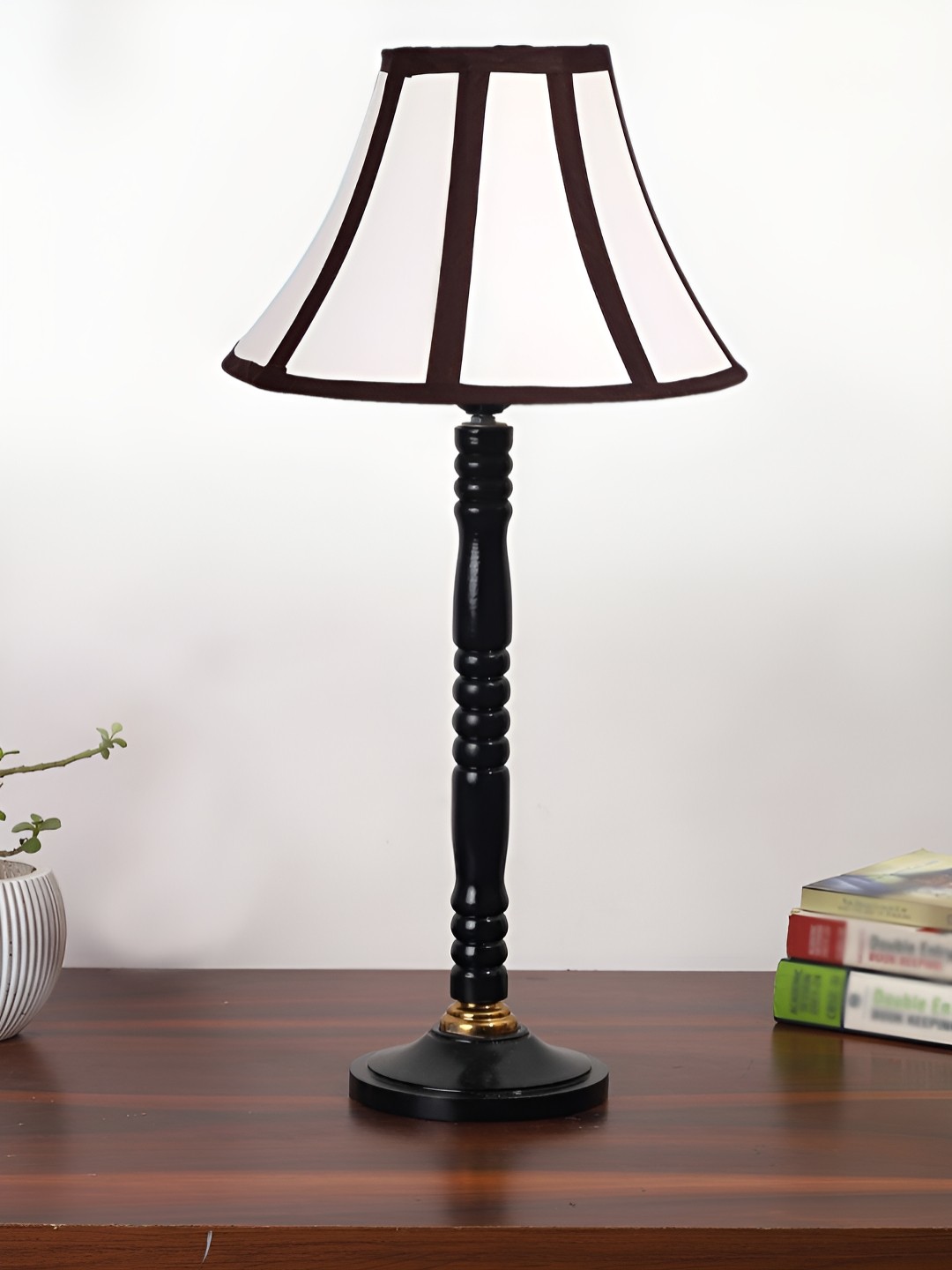 

Devansh Off White & Black Textured Frustum Shaped Wooden Table Lamp