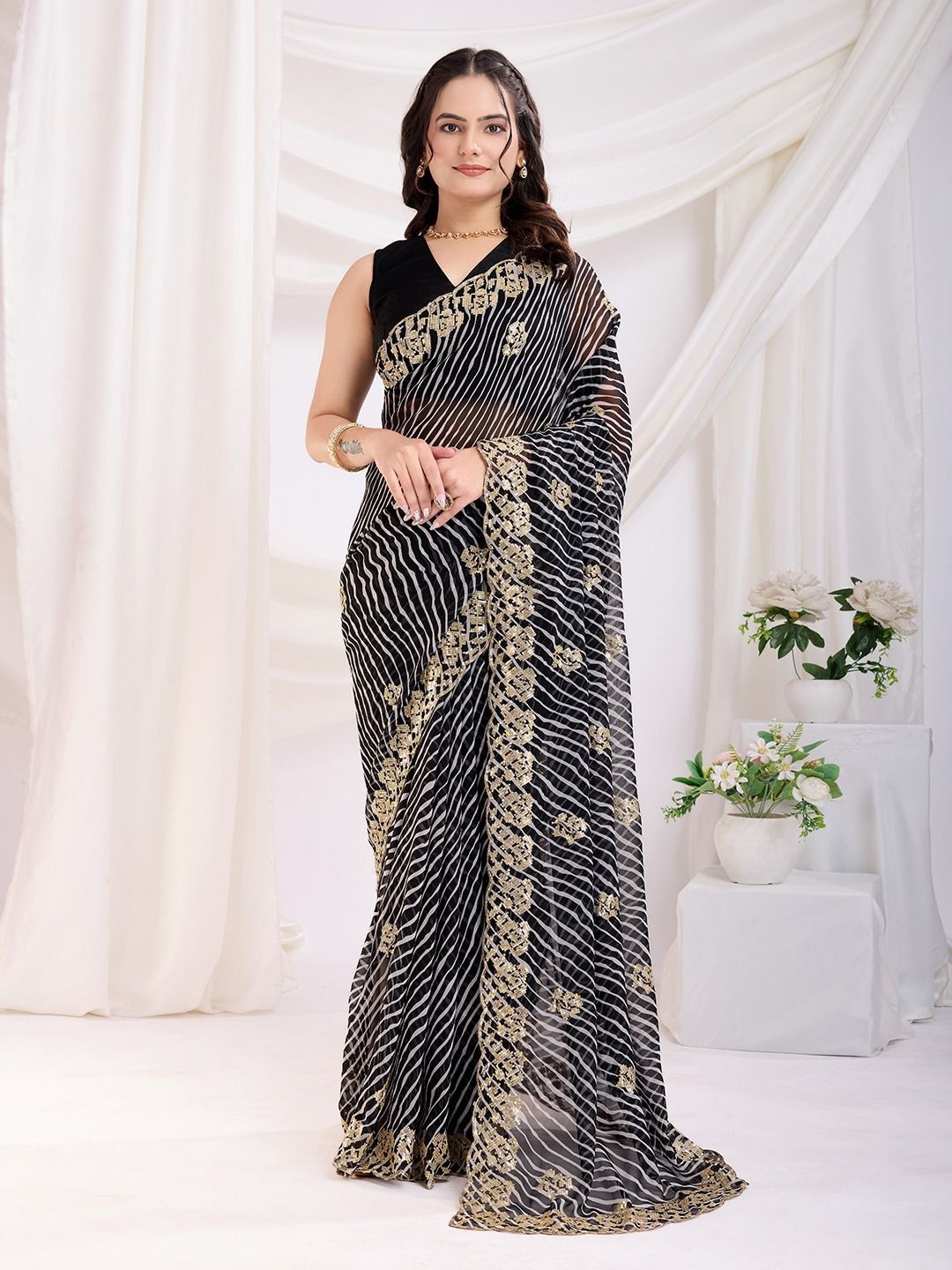 

VenderVilla Leheriya Sequinned Pure Georgette Saree, Black