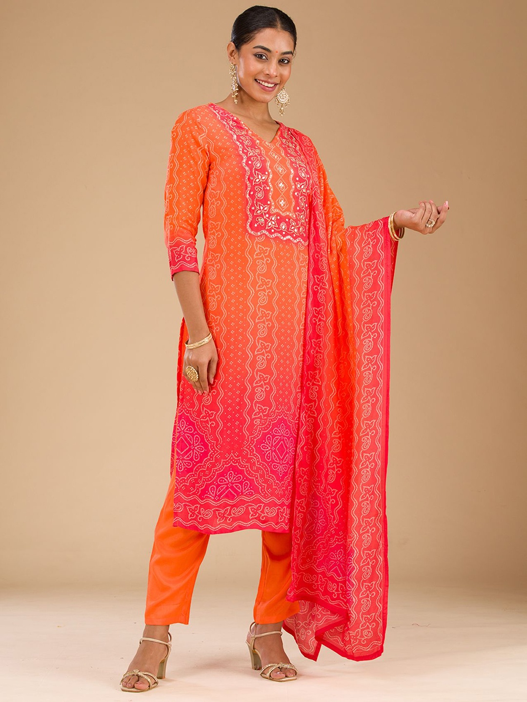 

Koskii Bandhani Printed Gotta Patti Straight Kurta With Trousers & Dupatta, Orange